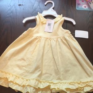 Yellow ruffled empire dress
